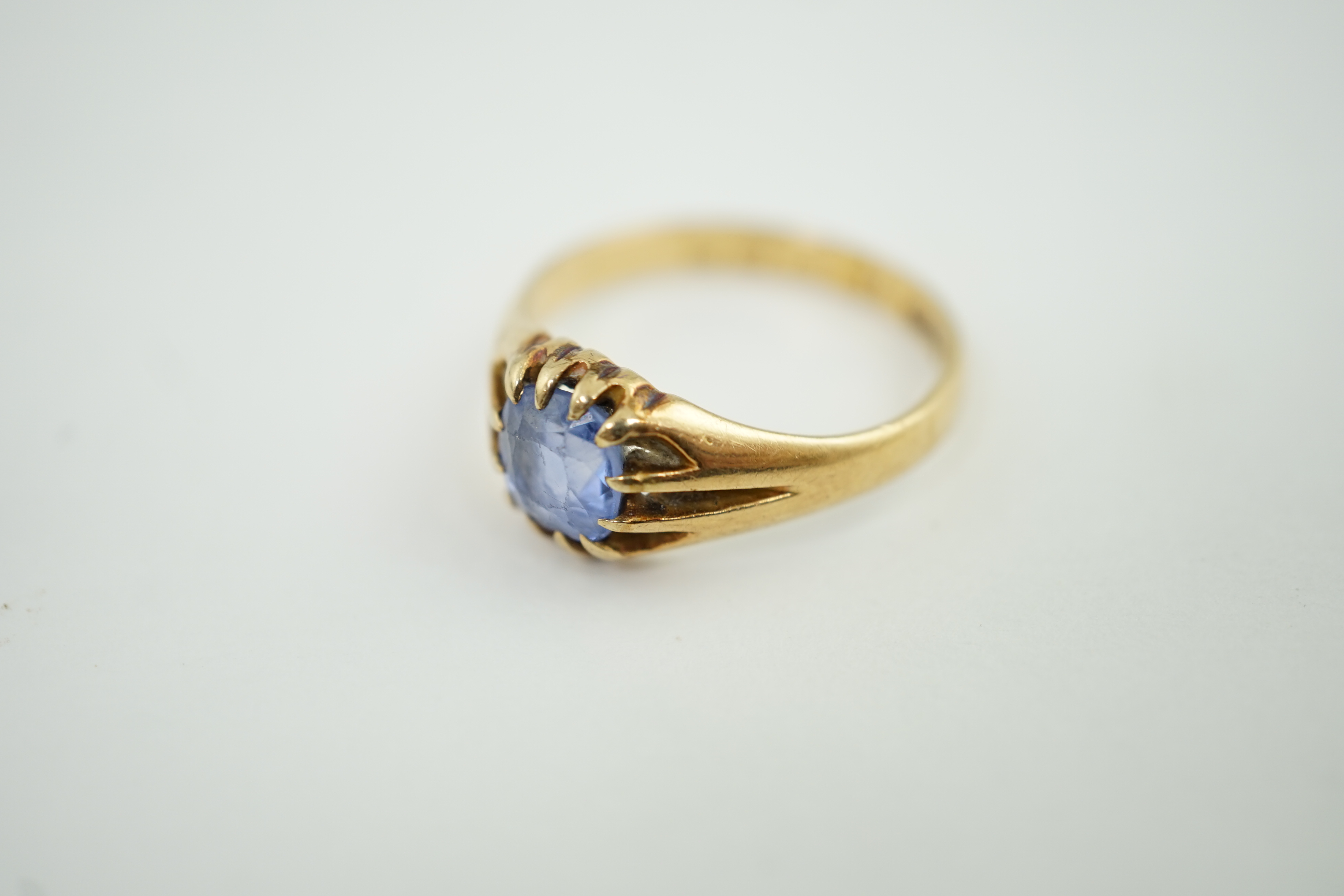 A George V gold and sapphire solitaire ring